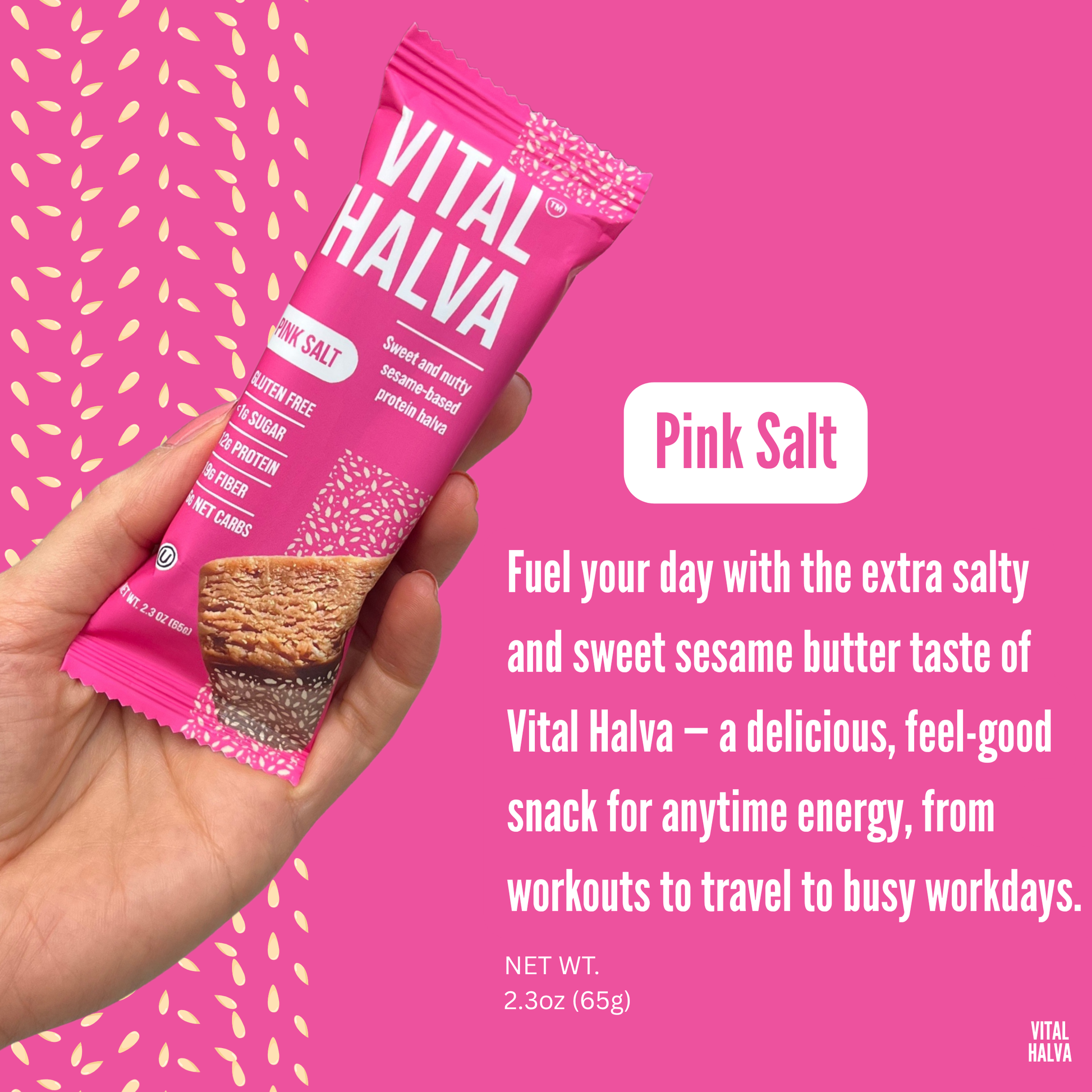 Vital Halva Pink Salt snack package held by a hand against a pink background