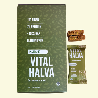 Vital Halva pistachio sesame snack bar packaging with a single bar on a light green background