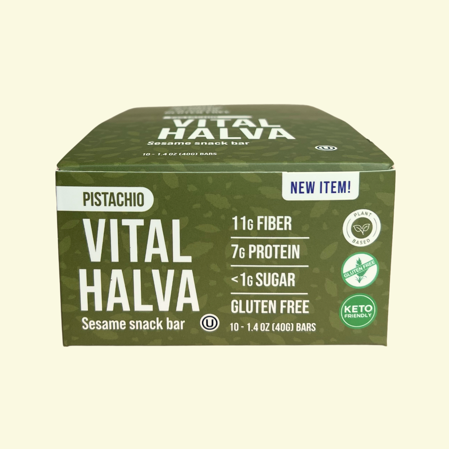 Box of Vital Halva pistachio sesame snack bars on a beige background